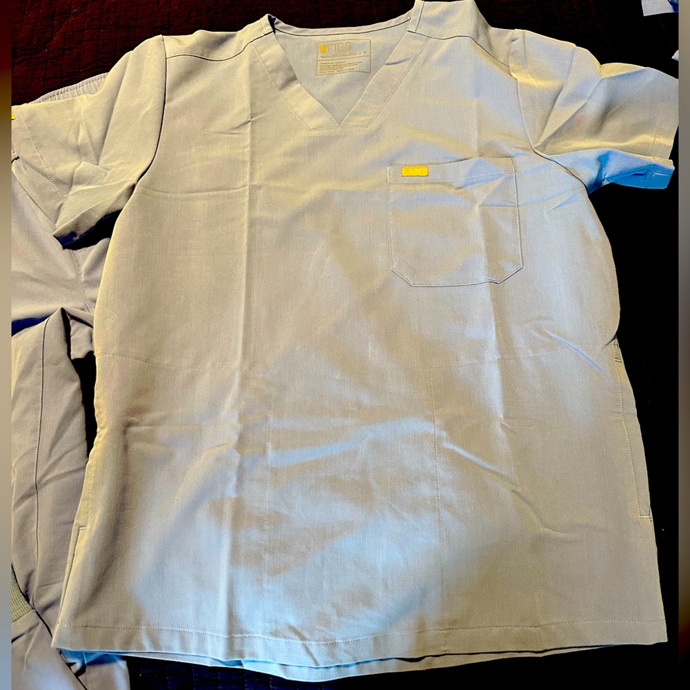 Blue figs scrubs.